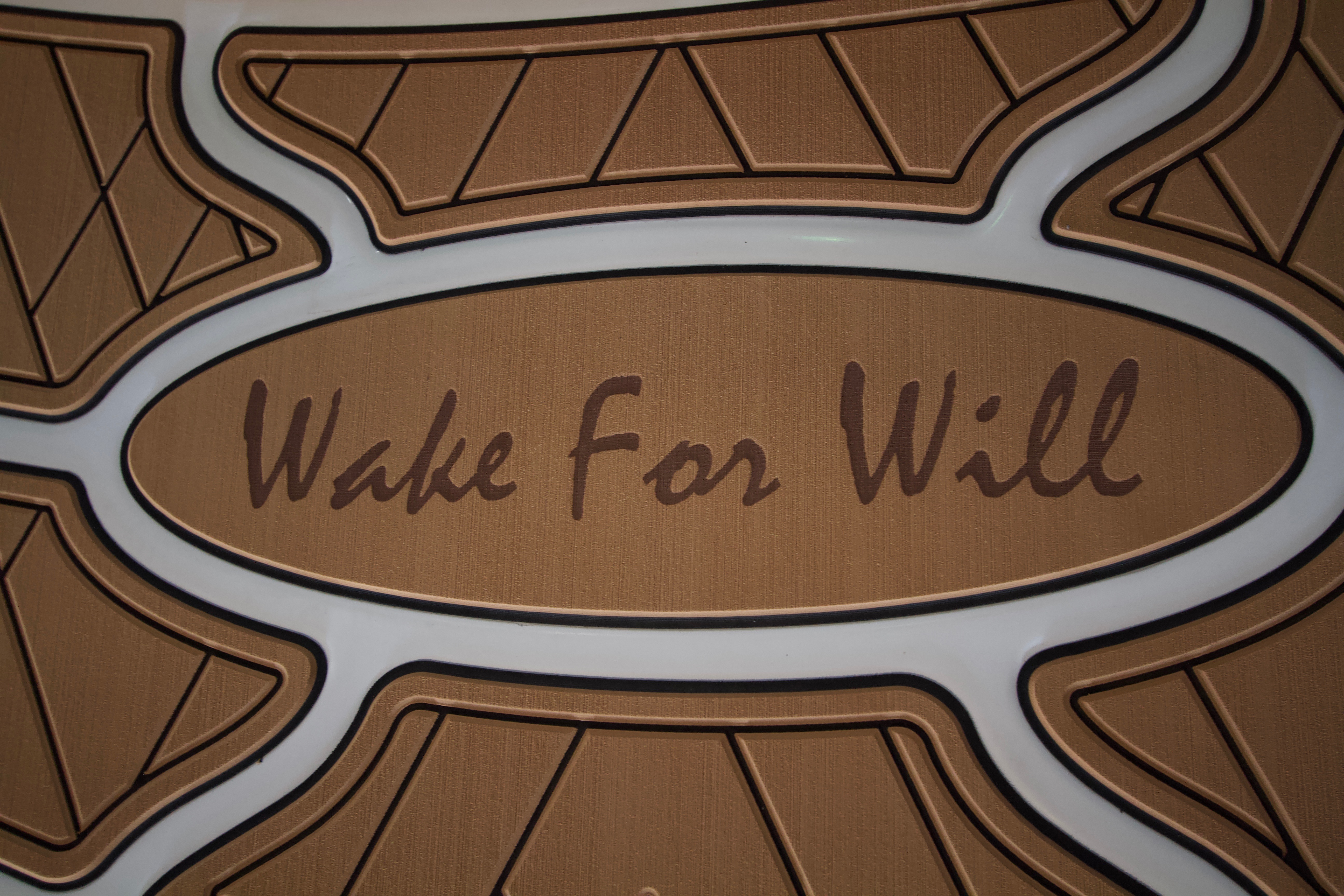 SeaDek swim platform that says wake for will. Hyperfit install. 