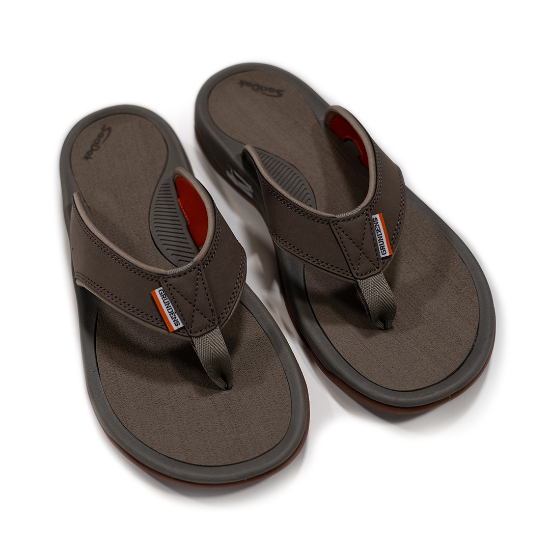 An overhead view of the men's Grundéns Deck Boss Sandal in Brindle. These sandals feature SeaDek insoles.