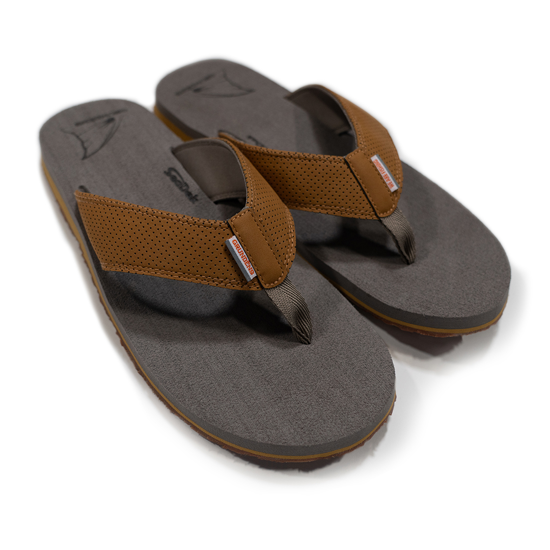A close-up photo of the men's Grundéns Species Sandal in Redfish Brown.
